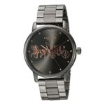 Elegant COACH Grand Watch with a carnation-gold Horse and Carriage emblem, ionized plated case, and bracelet-style band. 