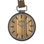 Stylish Dakota Walnut Wood Pocket Watch with zebrawood dial and tan leather strap, featuring a rustic yet elegant design perfect for unisex use. 
