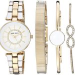 Anne Klein AK/3286WTST Swarovski crystal accented gold-tone and white watch with three matching bracelets