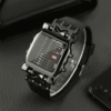 Black waterproof LED watch with a sleek rubber strap, colorful LED display, and multiple features for an active lifestyle. 