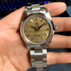 Men's Quartz Watch with sand-grain dial in stainless steel, showcasing a stylish yet durable design perfect for everyday wear and swim-proof capability.